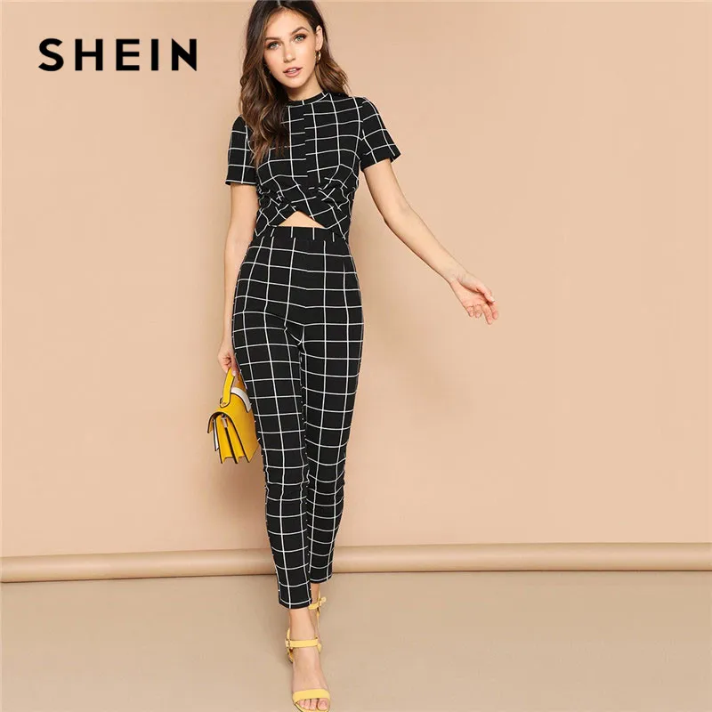 SHEIN تويست الجبهة الشبكة المحاصيل أعلى و بناطيل ضيقة مطابقة مجموعة النساء الملابس الربيع أنيقة قصيرة الأكمام منقوشة اثنين من قطعة مجموعة SHEIN تويست الجبهة الشبكة المحاصيل أعلى و بناطيل ضيقة مطابقة مجموعة النساء الملابس الربيع أنيقة قصيرة الأكمام منقوشة اثنين من قطعة مجموعة