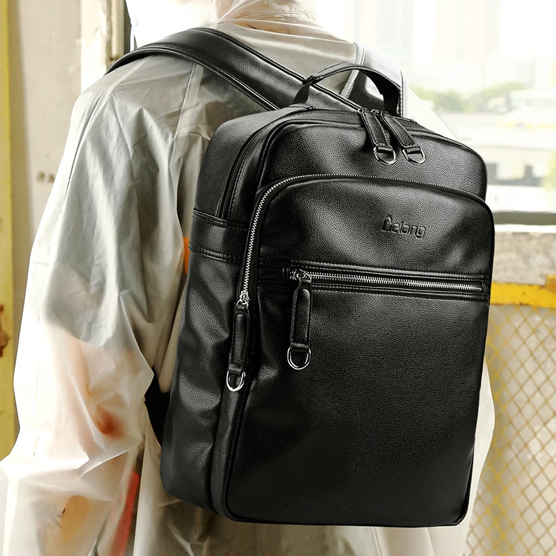 leather backpack with laptop sleeve