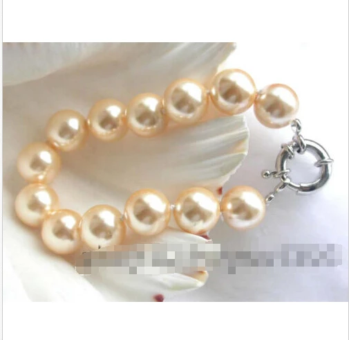 

Free shipping >>>>>>Stunning!14mm Yellow Round Sea Shell Pearl Bracelet!
