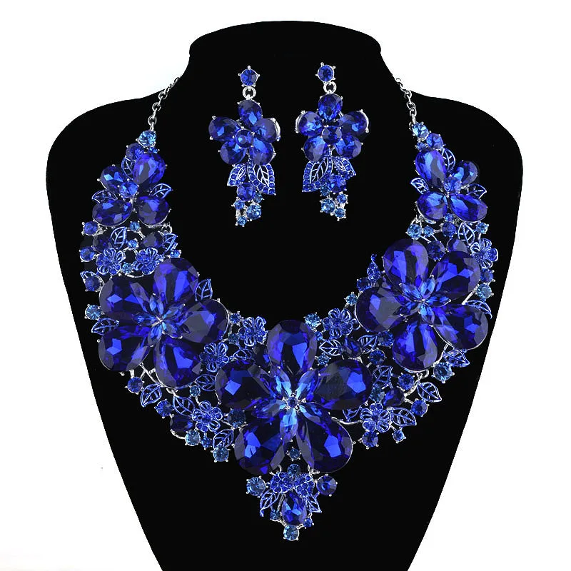 black dress with royal blue accessories