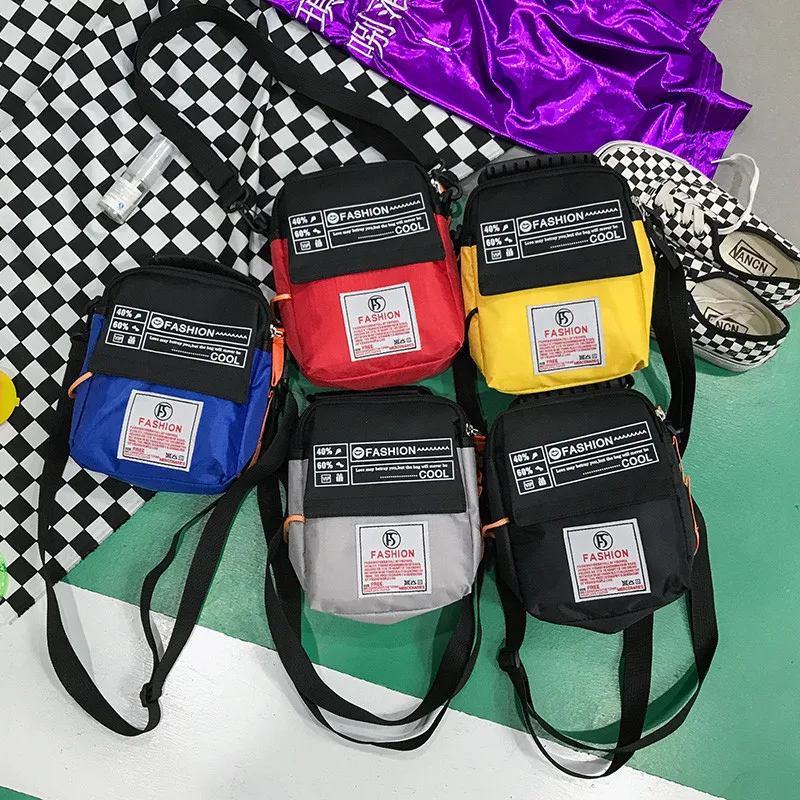 أزياء الساخن بيع جديد قماش المرأة الكتف رسول Crossbody حقيبة هاتف مصغر حقيبة الرجال الرياضة حقيبة صدر للرجال طالب صغيرة حقائب أزياء الساخن بيع جديد قماش المرأة الكتف رسول Crossbody حقيبة هاتف مصغر حقيبة الرجال الرياضة حقيبة صدر للرجال طالب صغيرة حقائب
