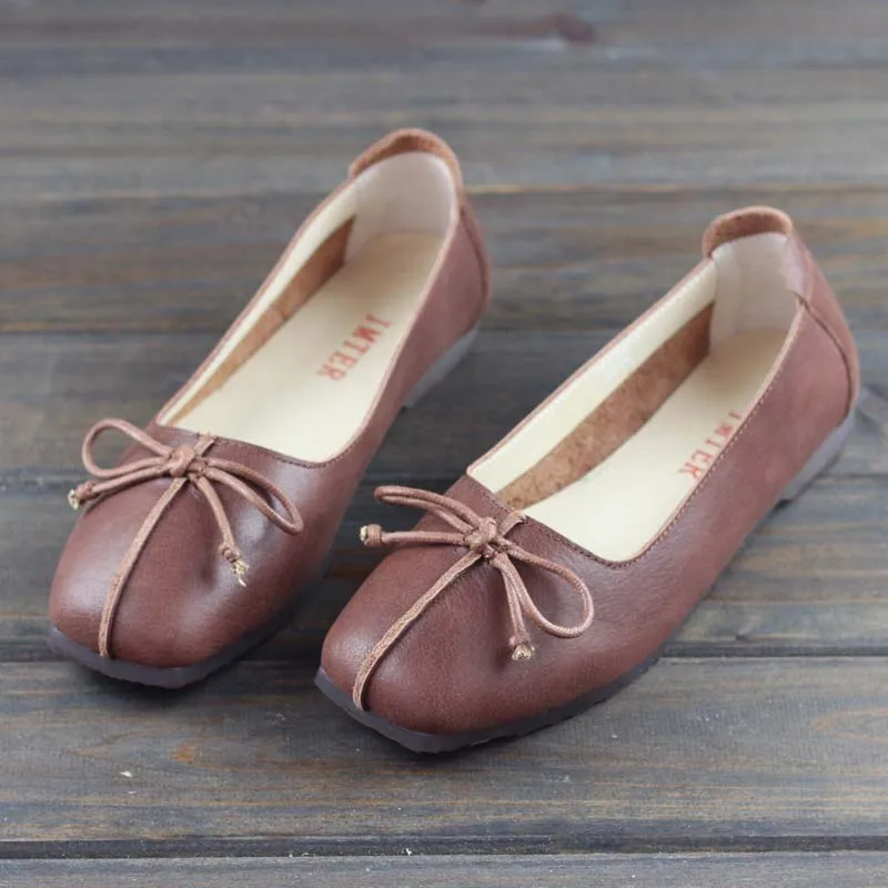 

New first layer cowhide baotou female slippers handmade leather flat sandals and slippers
