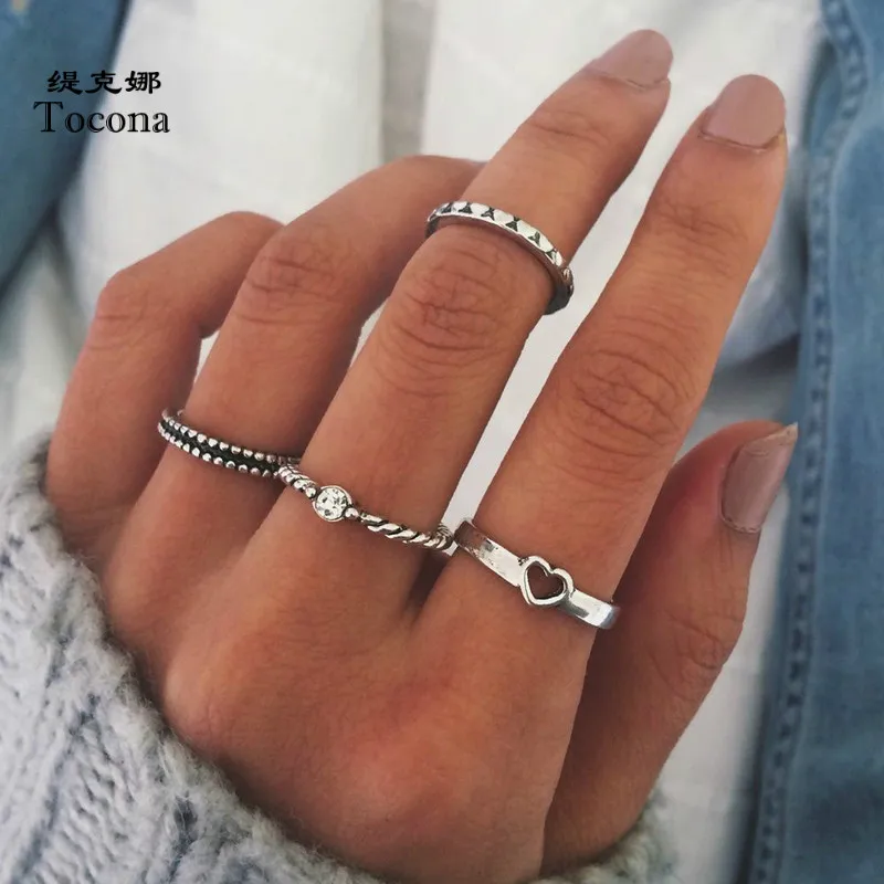

Tocona Factory Price New Fashion Simple Style Silver Color Finger Rings For Women Ladies Hollow Heart Shape Jewelry 4302