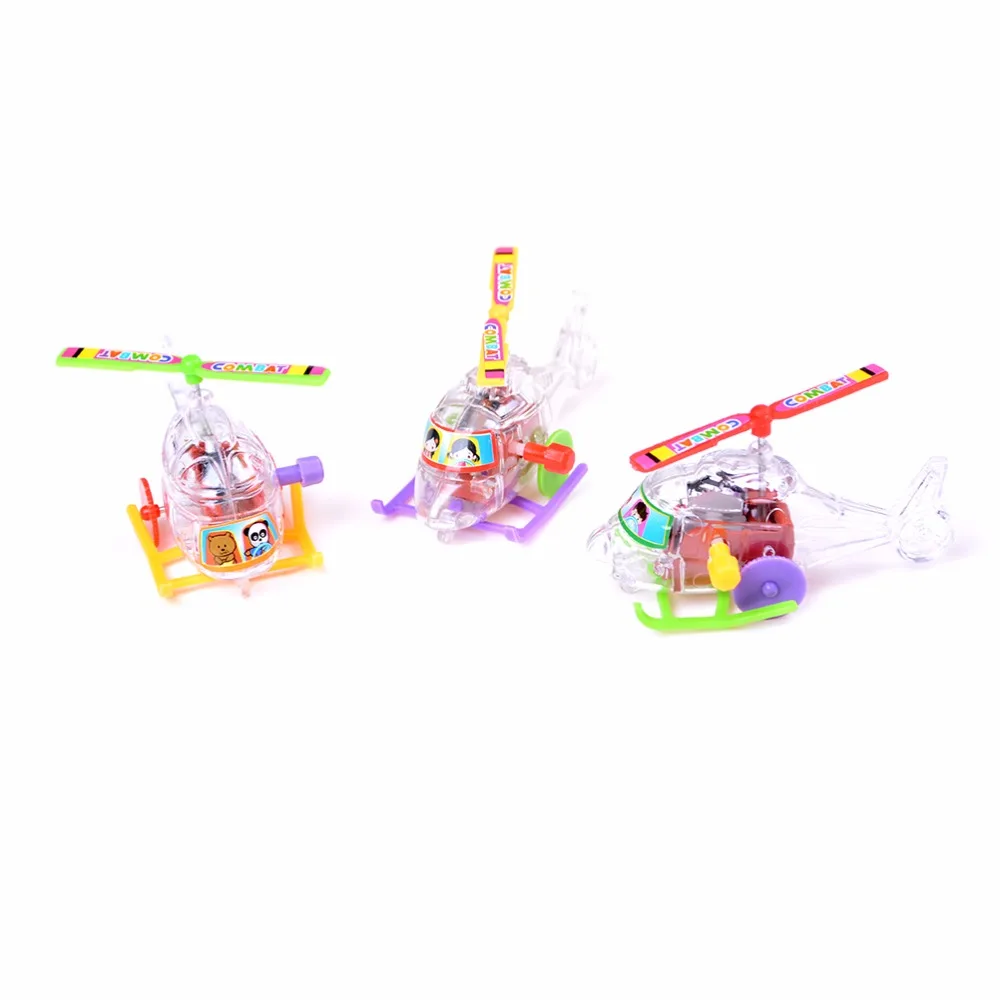 

New Quality Colorful Somersault Running Clockwork Funny Plane Baby Toys Environmental Materials Transparent Aircraft Wind Up Toy