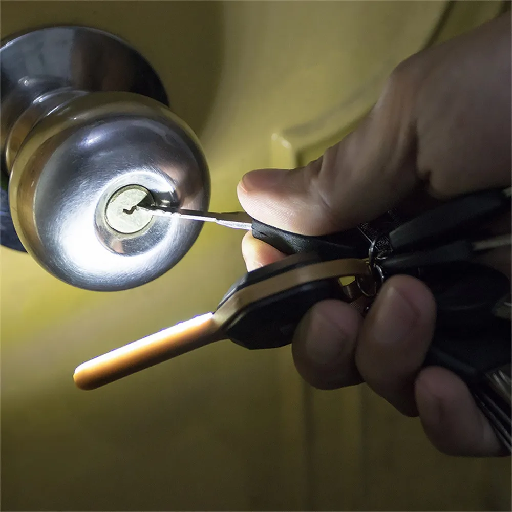

Hot Sale Practical portable Key Light Cover LED Bright Keychain Flashlight Keyring Cover Key Light edc multi tool Lowest Price