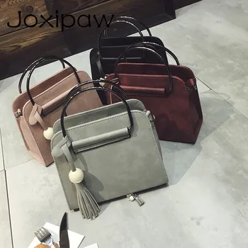

Fast shipping, 2018 new women handbags, fashion simple flap, retro Korean version shoulder bag, tassel woman messenger bag.