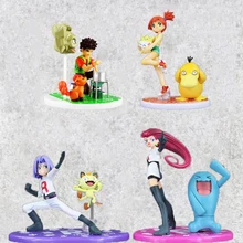 Anime juguete Charmander Misty Psyduck Togepi equipo cohete Jessie James Meowth Brock Vulpix lasllevan muñecas modelo