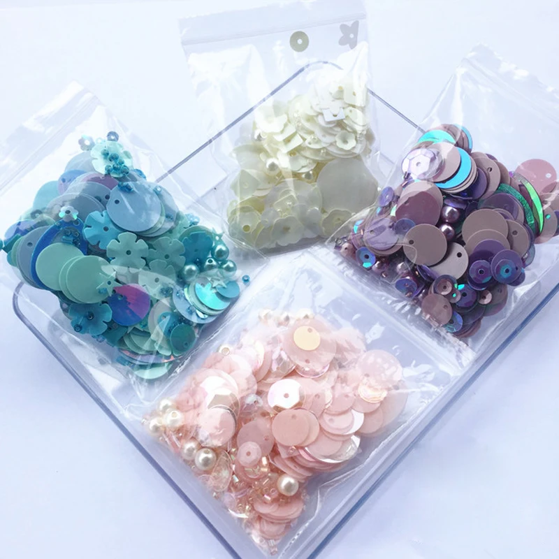 

Mixed size and shape 10gram/lot sequins sewing with hole many style available DIY rhinestones decoration for Dresses bag shoes