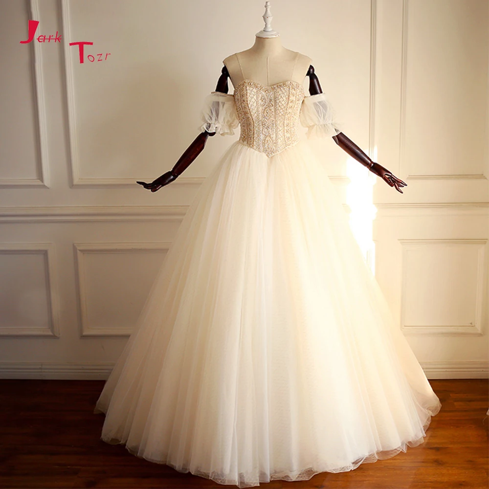 

Jark Tozr Custom Made Bridal Gowns Off The Shoulder Short Sleeve Sparkly Beads Pearls Tulle Ball Gown Wedding Dress Abito Sposa