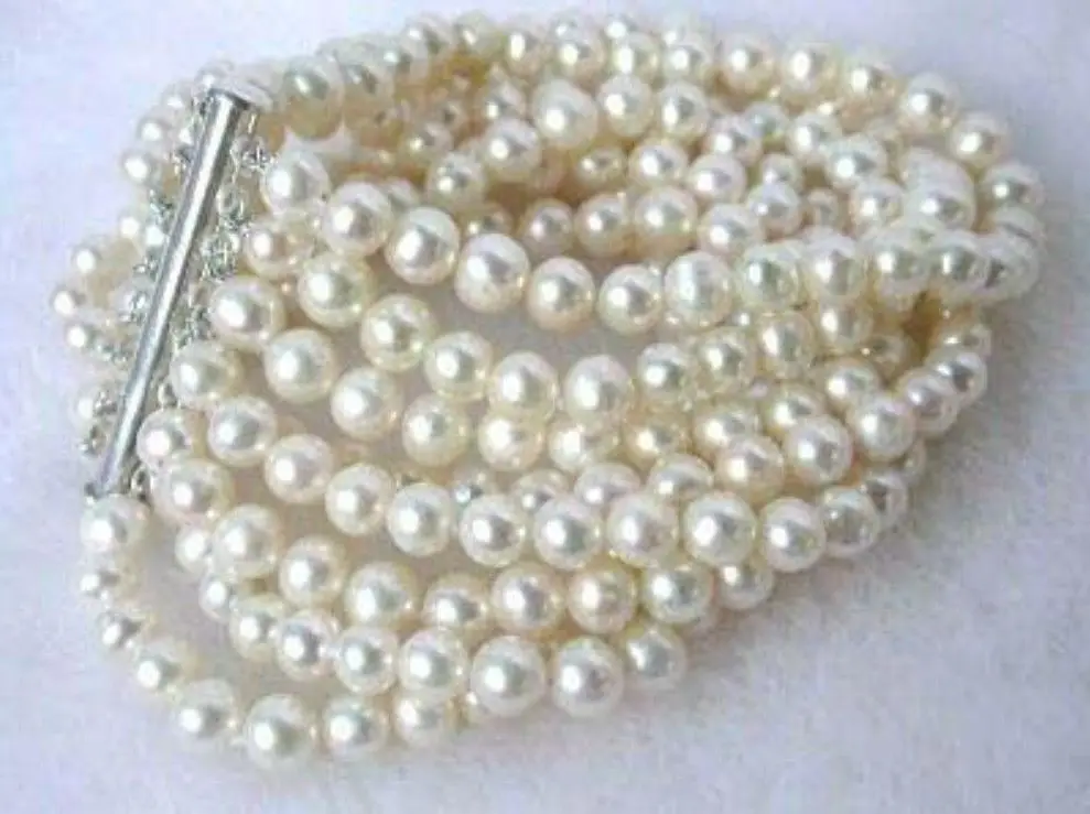 

Hot selling free shipping********8 rows 6-7mm white fresh water pearl bracelet 7.5 inch