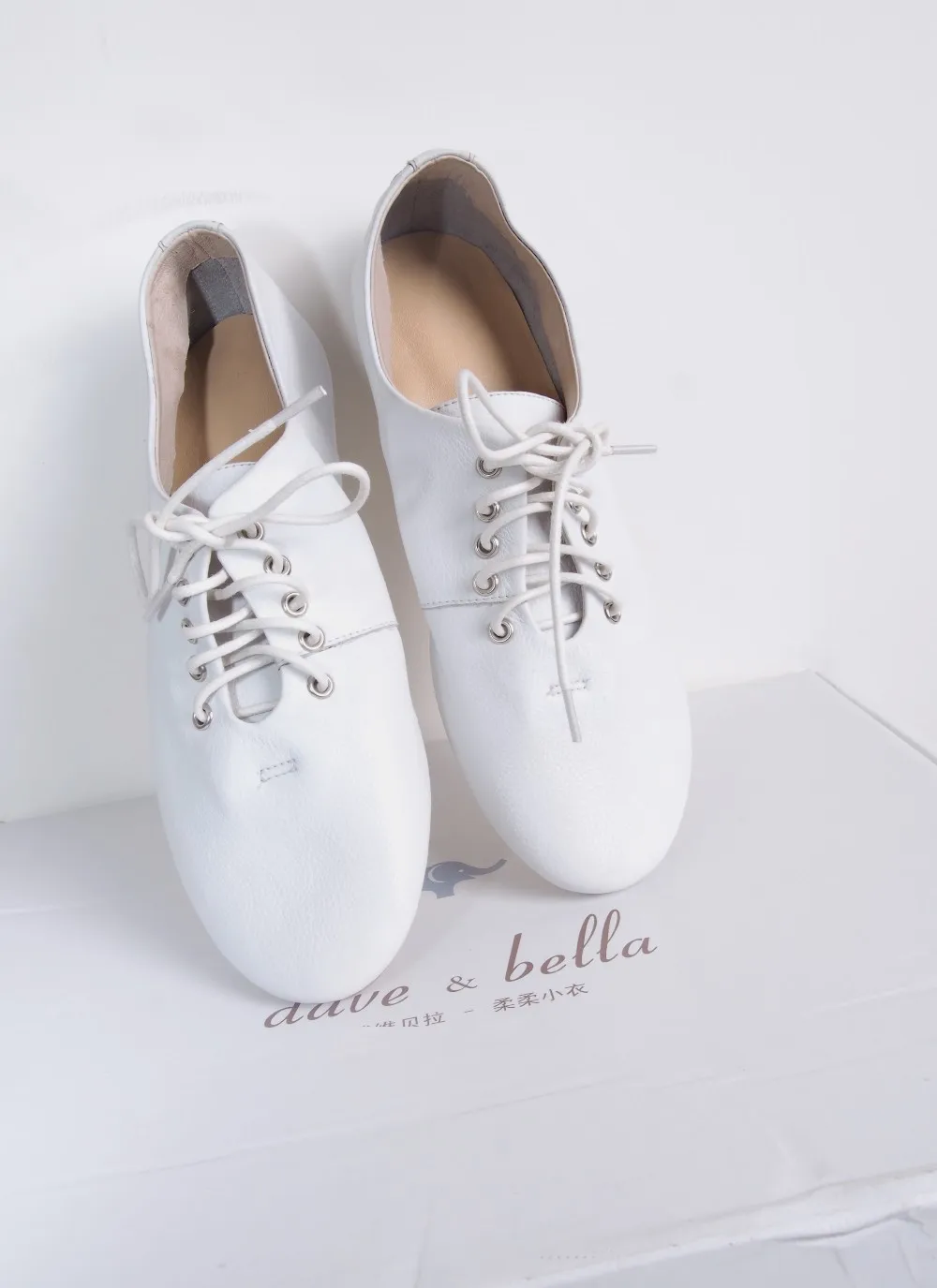 white leather lace up shoes