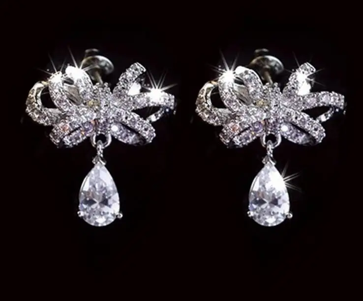 

Trendy White Gold Color Top Quality Micro Cubic Zirconia Cute Bow Knot Shape Stud Earrings For Women Fashion Party Jewelry