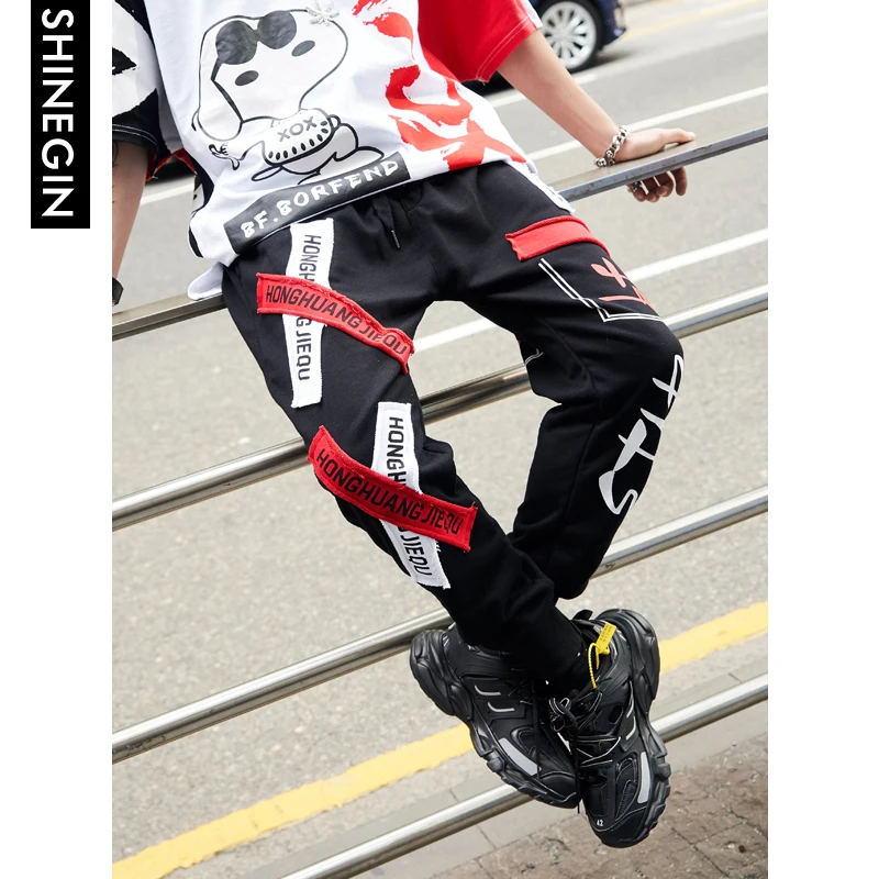 SHINEGIN Streetwear Stitching Color Joggers Hip Hop Pants Men Elastic Waist Cargo Pants Tapered Pants Pantalon Homme 072W SHINEGIN Streetwear Stitching Color Joggers Hip Hop Pants Men Elastic Waist Cargo Pants Tapered Pants Pantalon Homme 072W