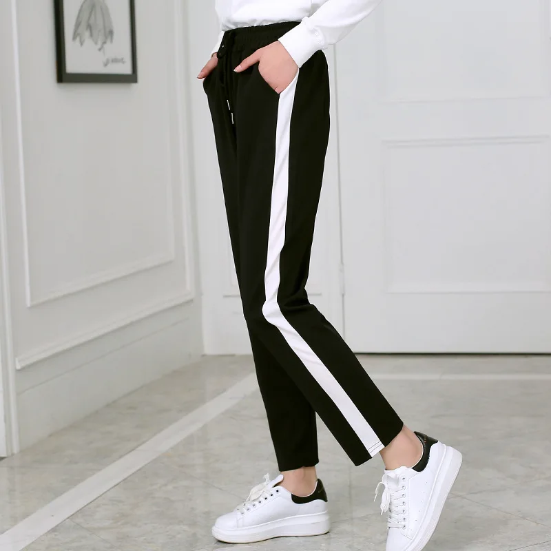 womens black pants with white stripe