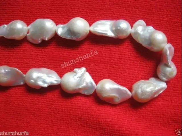 

Free shippingREAL HUGE AAA SOUTH SEA WHITE BAROQUE PEARL NECKLACE 18" 14K Buckle 6.09
