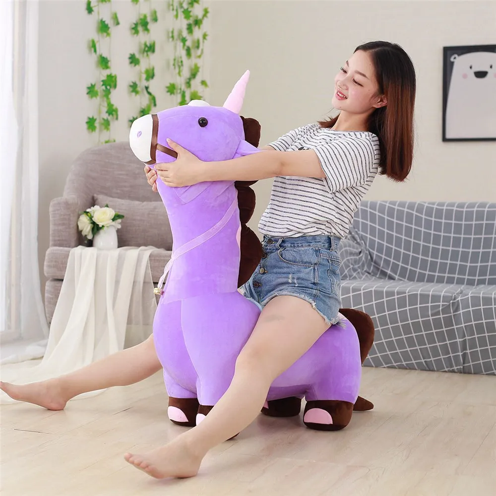 girls riding stuffed animals