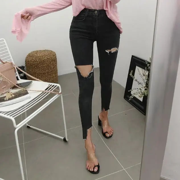 

Korean version of the new wear broken side feet pants scratch hole high elastic was thin nine pants jeans 7298#
