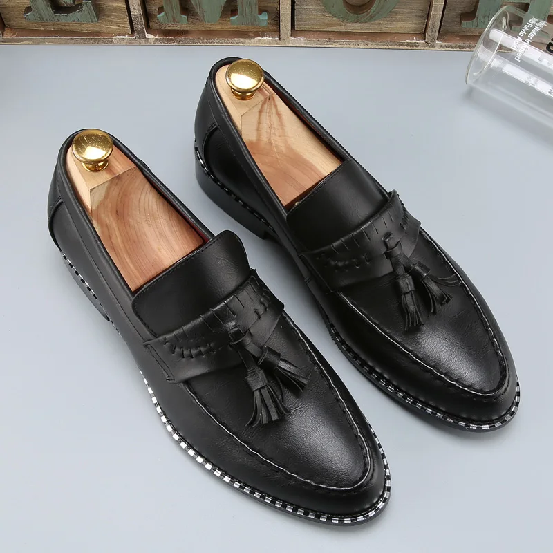 pointed toe flats with tassels