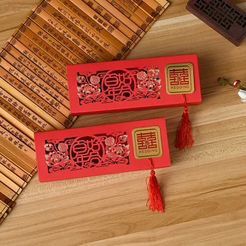 

100pcs Traditional Chinese Red Candy Box with Tassels Hollow Out Double Happiness Chocolate Box Wedding Favor Boxes WB121