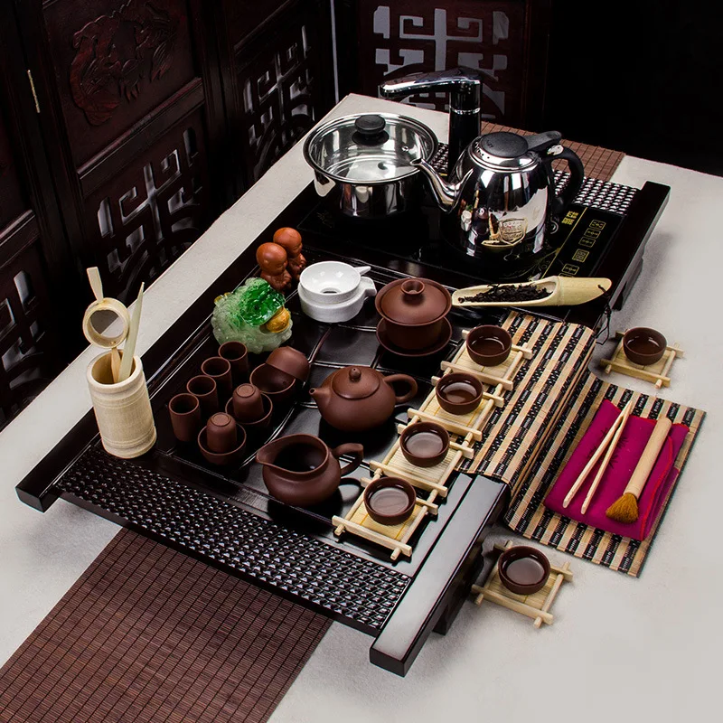 

Kung Fu tea tea set Yixing special offer four in one electromagnetic oven Ru ceramic crystal solid wood tray