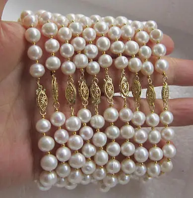 

Shipping >> new hot WHOLESALE 10 PC 8-9MM AAA++ WHITE SOUTH SEA PEARL BRACELET 7.5 IN 14K GOLD CLASP