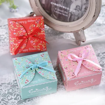 

Free delivery 100pcs,Idyllic candy box,wedding candy boxs,chocolate box,gift box,Free Ribbon,size:8-9.5cm