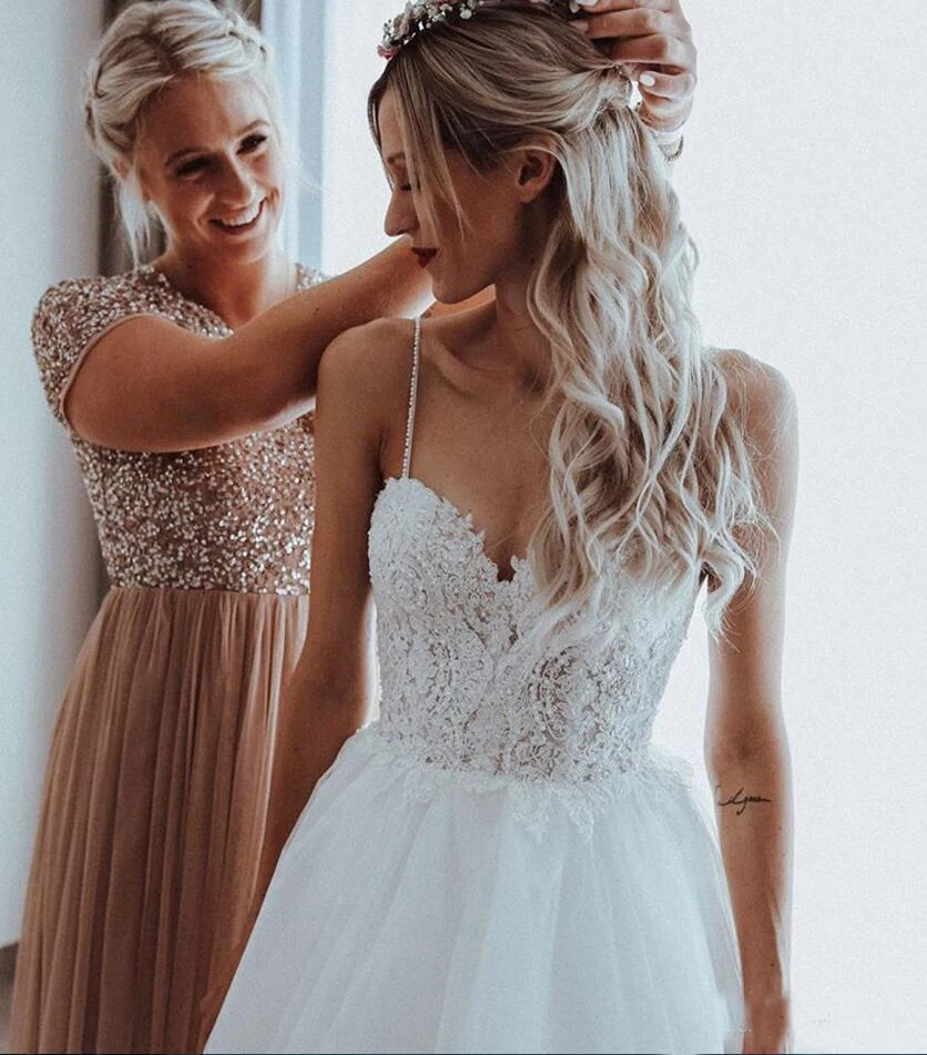 

Sexy Backless Beach Boho Wedding Dress 2019 Spaghetti Straps Lace Applique Beads Pearls Tulle Wedding Gowns For Brides
