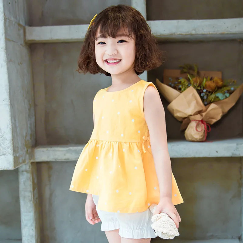 

2019 Summer New Yellow Irregular Hem Wave Point Girl Fashion Suit O-neck Polka Dot Sleeveless Pullover + White Leisure Shorts