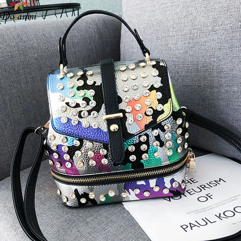 

DORANMI Holographic Schoolbag Women's Backpacks 2019 Fashion Small Backpack Female Back Shoulder Bag Diamond Mochila DJB307