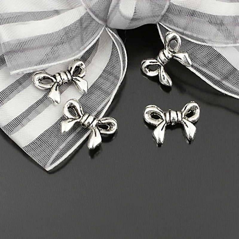 

(22953)50PCS 14x10MM Antique Silver Zinc Alloy Bow Spacer Beads Bracelets Beads Diy Jewelry Findings Accessories Wholesale