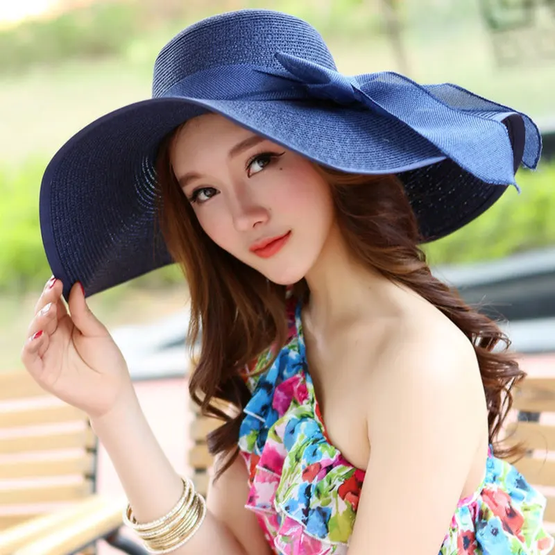 النساء كبير Bowknot مرن قبعة الشمس طوي القش واسعة بريم الصيف شاطئ كاب TY53