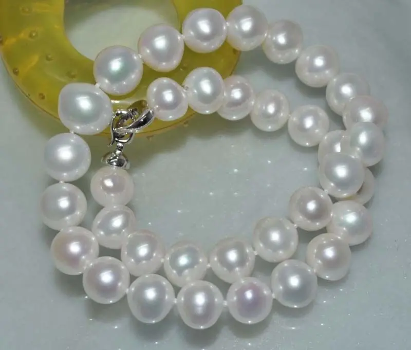 

Free Shipping >>Outstanding luster Natural Rara white 12mm Cultured Pearl Necklace J9842