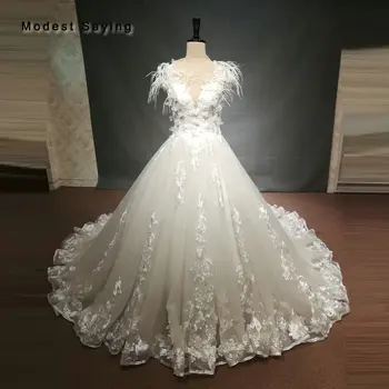 شراءفاخر الكرة ثوب العاج الريشة الزهور الرباط فساتين زفاف 2018 الموضة الحبيب أثواب الزفاف مع الوهم عودة مخصص