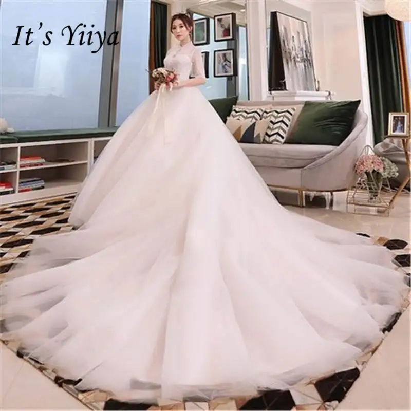 

It's YiiYa Fashion Half Sleeve White Wedding Dresses Elegant Backless Long Train Wedding Gowns DV001