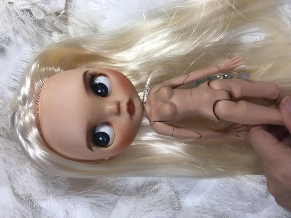 

Brunette dolls in muscle freckles of sunburn in western style Excluding clothes.