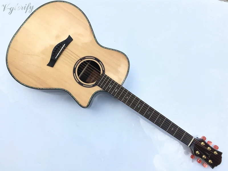 

high grade hand made solid spruce top acoustic guitar