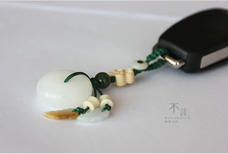 

High-end boutique car keychain White jade safety buckle Hand-made live buckle if the pendant is safe and auspicious Report This