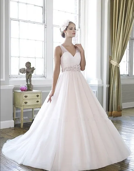 

ball gown micro-beaded floral sash Soft tulle pleated draped sweetheart bodice creating illusion sleeves bridal wedding dress