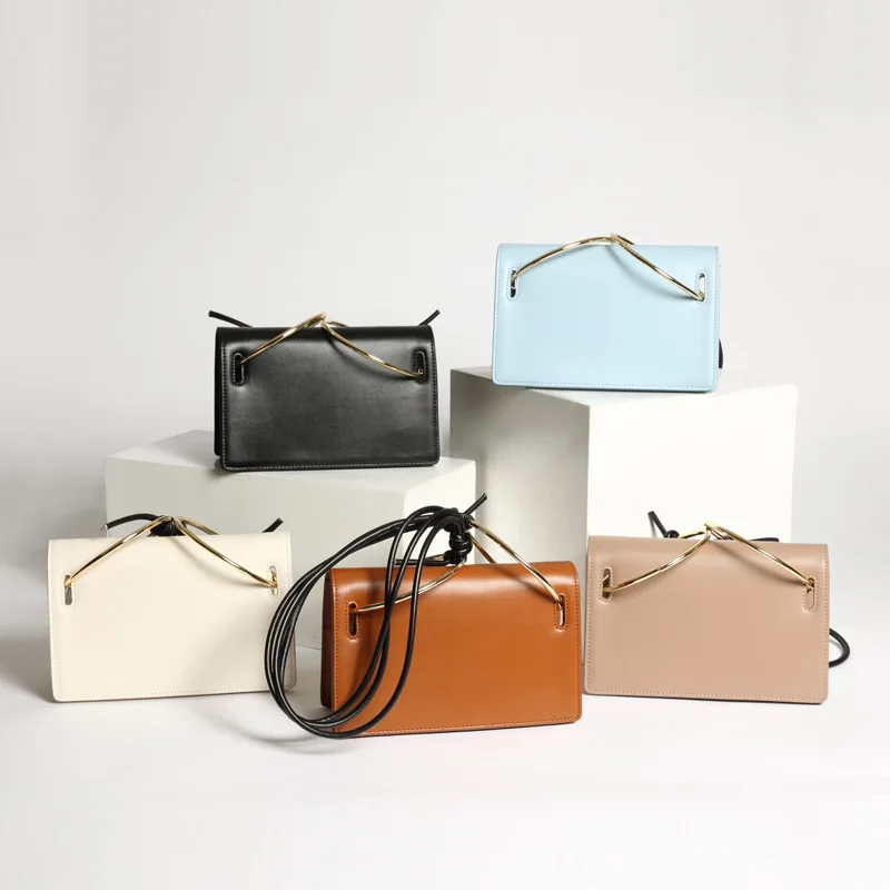 

Fashion One-shoulder Female Bag Personality Hand-held Oblique Satchel Metal Ring Cowhide Xiao Fang Bag Is Simple and Simple LA70