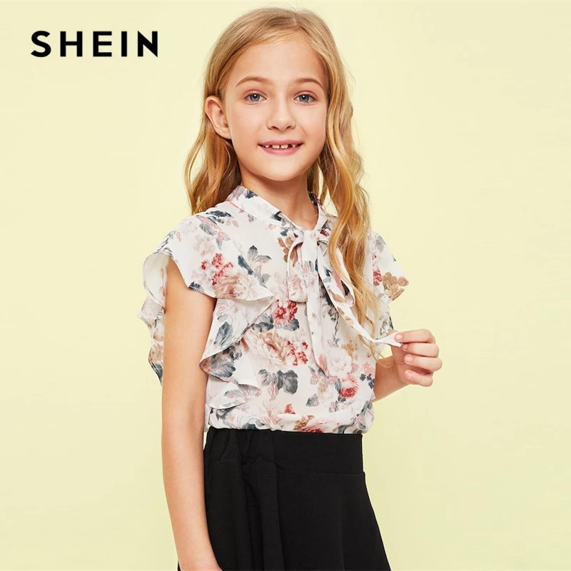 SHEIN Kiddie Tie Neck Ruffle Armhole Floral Print Girl Cute Blouse Children 2019 Summer Butterfly Sleeve Button Kids Shirts Tops SHEIN Kiddie Tie Neck Ruffle Armhole Floral Print Girl Cute Blouse Children 2019 Summer Butterfly Sleeve Button Kids Shirts Tops