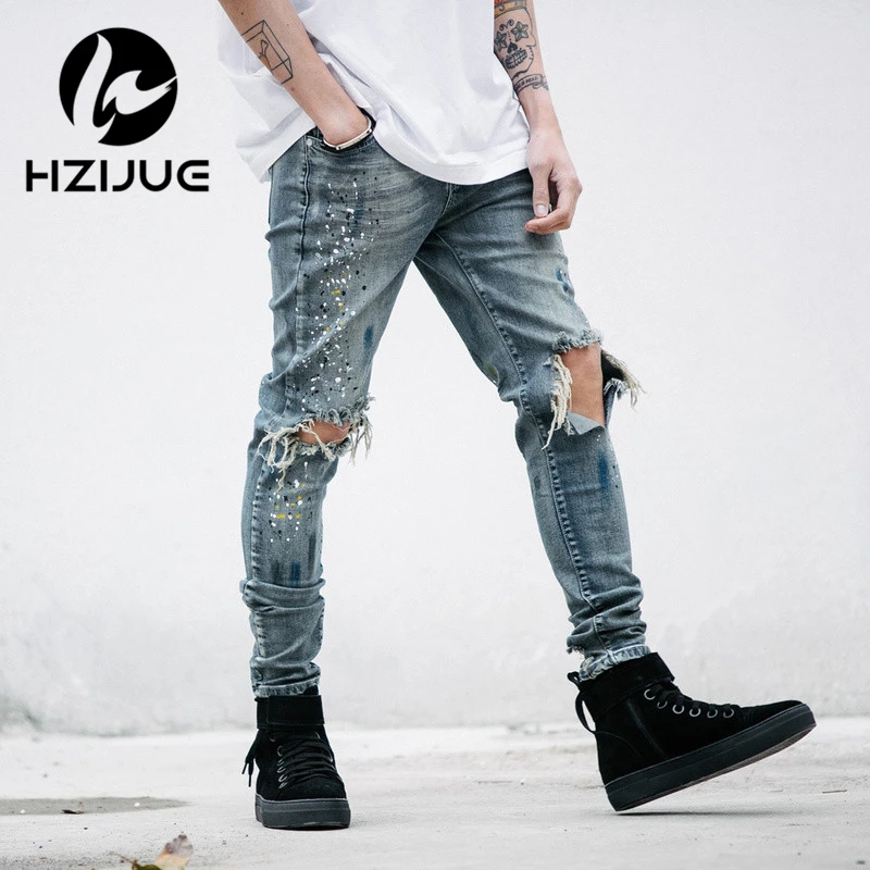 

HZIJUE mens designer clothes denim jumpsuit jean pants korean rock splash-ink stretch moto distressed ripped skinny jeans men