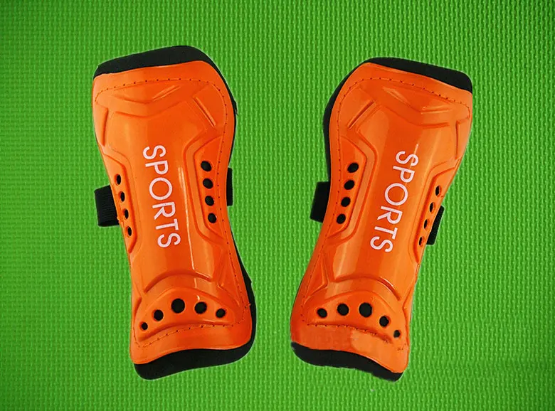 GSZHXCK футбол щитки ноги протектор Силиконовый в виде ракушки EVA подкладка shinguards футбол тонкие голени колодки для взрослых 1 пара - Цвет: orange