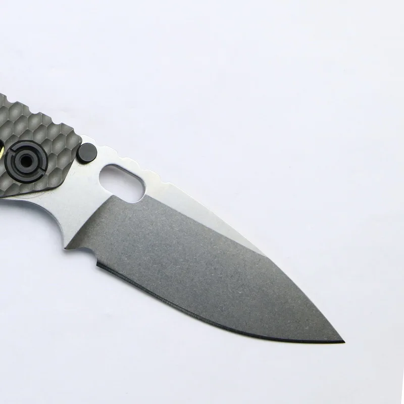 Фото TIGEND SNG TC4 титановая ручка D2 лезвие медная шайба складной охотничий кемпинг TIGEND SNG TC4 титановая ручка D2 лезвие медная шайба складной охотничий кемпинг