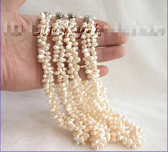 

FREE shipping>>>>4piece 3row white freshwater pearls necklace new