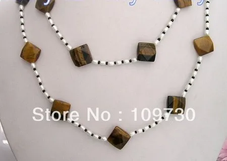 

Jewelry 0012563 37" White Freshwater Pearl Faceted Tiger Eye Necklace