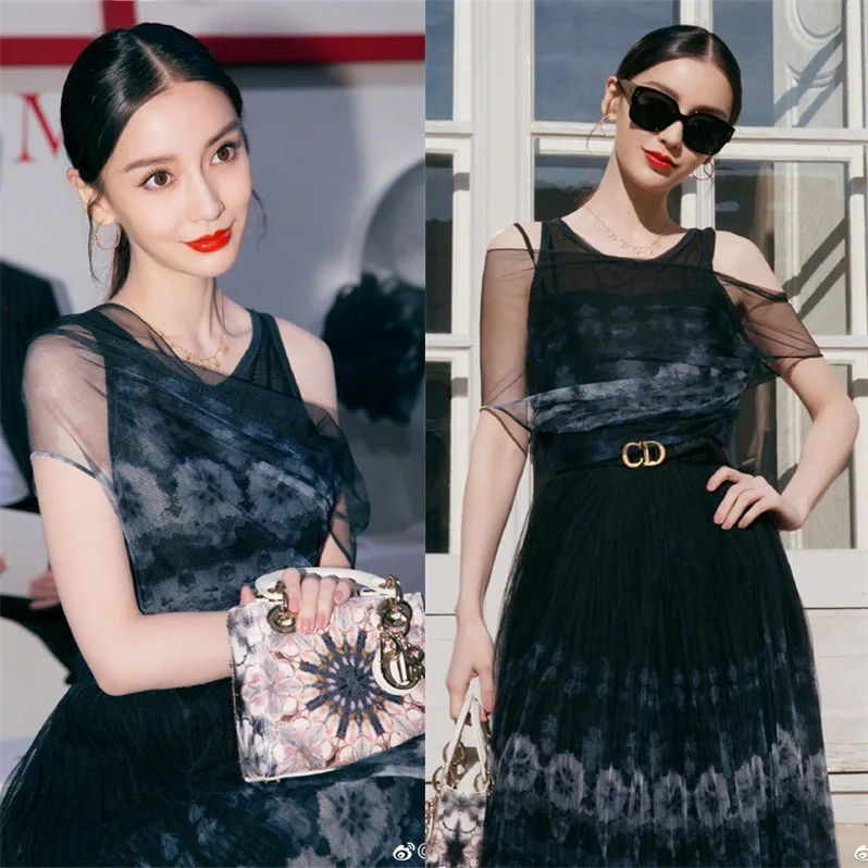 

Yangying Star of The Same Korean Version of The Chiffon Screen Yarn Printing Slimming Pleated Middle Skirt Women 2019