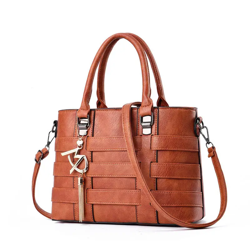 Amberler Большая вместительная сумка из искусственной кожи, женская модная сумка через плечо, роскошная дизайнерская повседневная женская сумка-тоут с кисточкой - Цвет: brown