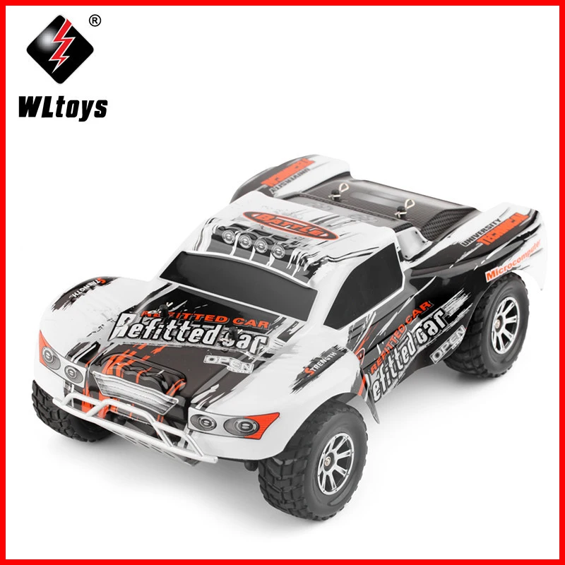 

Original Wltoys RC Car A969 1/18 Scale Toys 2.4G 4WD 70km/h RC Drift Short Course Long Distance Control 4-wheel Shock Absorbe