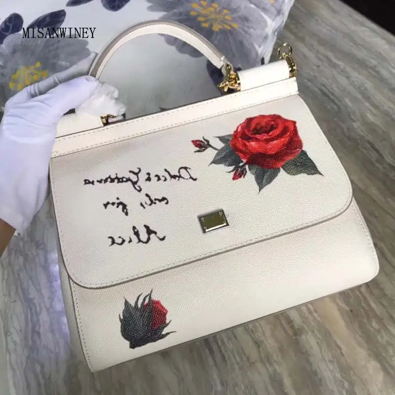 

2018 European and American new style Sicilian color printed rose lady handbag, English printed single shoulder skew spanning bag