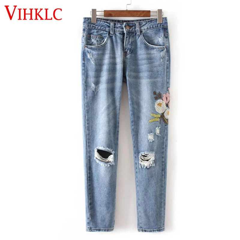 jeans with flowers on the side